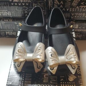 Mini Melissa EUC 8T black and off white bow